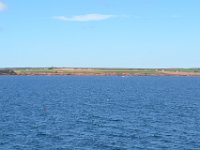 12  L'île, ses falaises rouges et ses champs : L'île du Prince Edouard est célèbre pour sa culture des pommes de terre.
