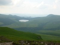 5  Le Lac de Guéry et au loin la Roche de Tuilière et Sanadoire